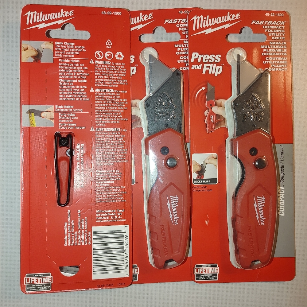 Three Milwaukee FASTBACK compact folding utility knife